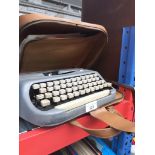 A Royal "Royalite" portable typewriter Catalogue only, live bidding available via our website.