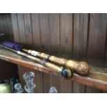 A bamboo parasol and cane topped with polished stone Catalogue only, live bidding available via