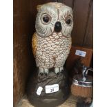 A large owl figurine. Catalogue only, live bidding available via our website. Please note if you