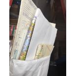 An envelope containing aeronautical charts etc Catalogue only, live bidding available via our