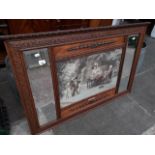 An overmantle mirror with print insert Catalogue only, live bidding available via our website. If