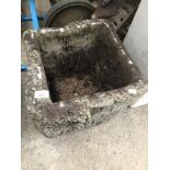 A concrete planter. Catalogue only, live bidding available via our website. Please note if you