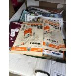 A box of football programmes. Catalogue only, live bidding available via our website. Please note if