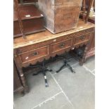 An oak three drawer sideboard Catalogue only, live bidding available via our website. Please note if
