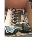 A large collection of old family photographs Catalogue only, live bidding available via our website.