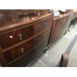 A mahogany bow front chest of drawers and matching dressing table Catalogue only, live bidding
