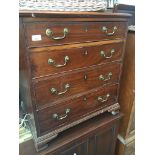 A mahogany four drawer chest of small proportions with brass swan neck handles Catalogue only,