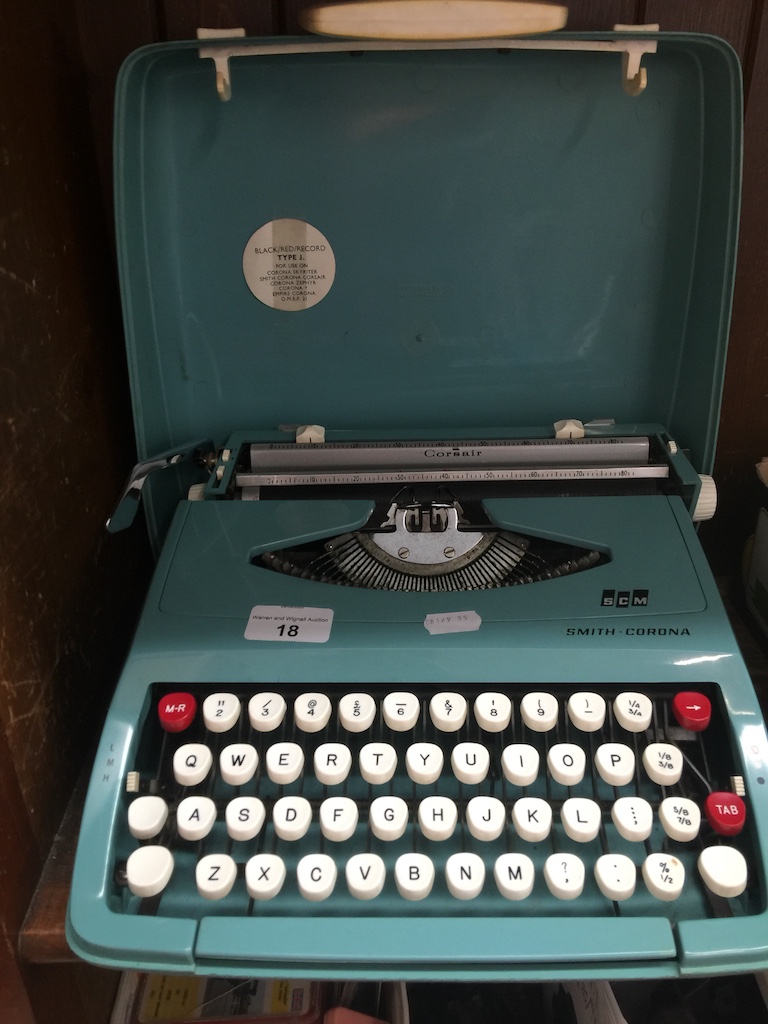 A vintage 60's Corsair Smith Corona typewriter. Catalogue only, live bidding available via our