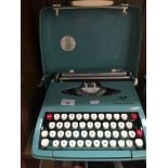 A vintage 60's Corsair Smith Corona typewriter. Catalogue only, live bidding available via our