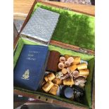 A wooden box containing misc items including Wade Whimsies Catalogue only, live bidding available