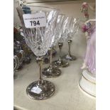 4 leaded crystal wine glasses with plated bases Catalogue only, live bidding available via our
