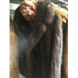 A fur coat and a fur hat. Catalogue only, live bidding available via our website. Please note if you