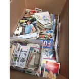 A box of football cards, stickers etc Catalogue only, live bidding available via our website. Please
