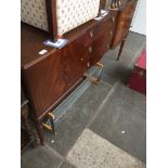 An upholstered box and a mahogany reproduction sideboard Catalogue only, live bidding available