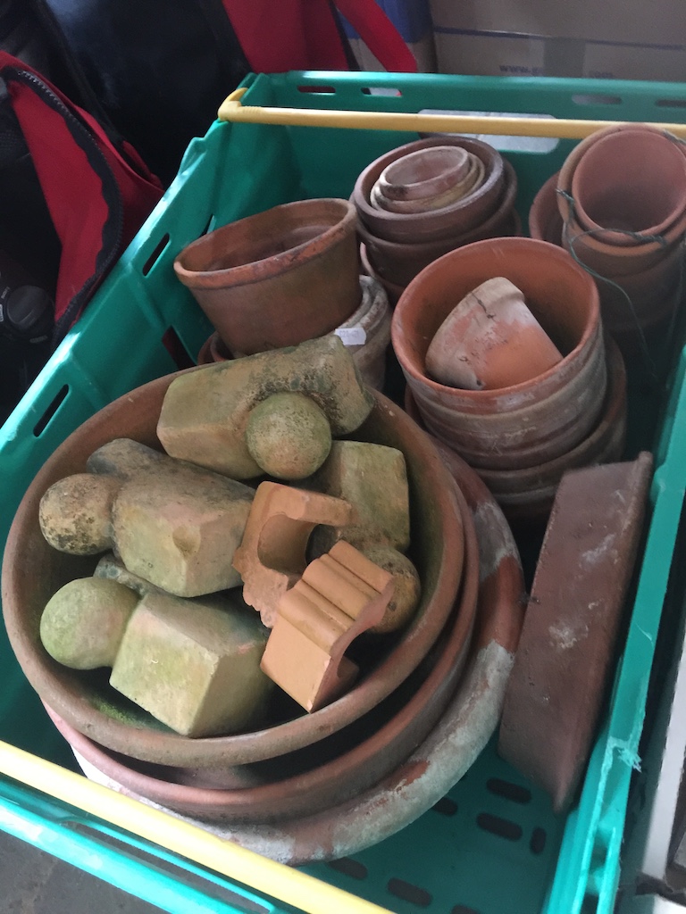 A crate of terracotta plant pots Catalogue only, live bidding available via our website. Please note
