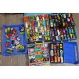 Three Matchbox carry cases, one 'Car Service' carry case and a blue crate of various Matchbox,