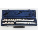 A silver plated flute in case.