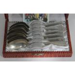 A cased set of reproduction German SS teaspoons.