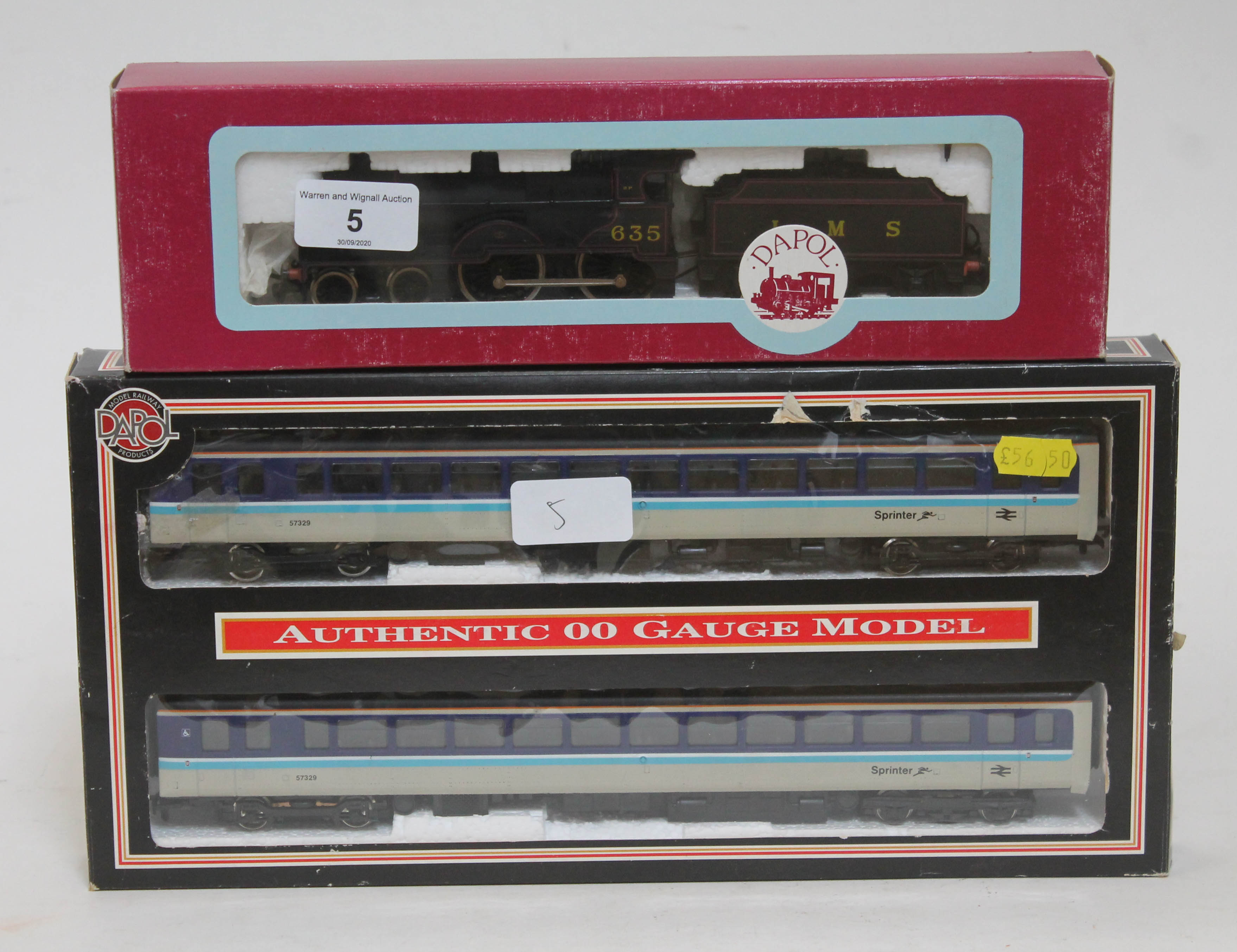 A boxed Dapol model railways 00 gauge 635 loco and LMS tender, D15 4-4-0 2P black together with a