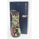 A Modern Moorcroft pottery vase, height 21cm, with box.