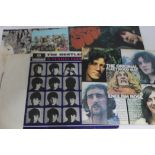 A quantity of LPs comprising The Beatles Sgt. Peppers Lonely Hearts Club Band, Revolver, Rubber