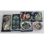 A group of six modern Moorcroft pottery dishes, five with boxes.