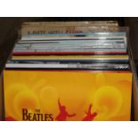 A box of mainly Beatles re-issues vinyl Lps