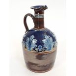 A Doulton Lambeth stoneware"Scotch" flagon, numbered 4139.