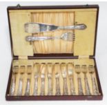 A cased set hallmarked silver handled fish easters and servers.