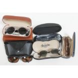 Five pairs of designer sunglasses comprising: Illesteva, Serengetti(2), Maui Jim and Hugo Boss.