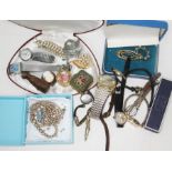 A mixed lot of mainly costume jewellery including ladies watches, brooches and a pair of Cadbury