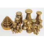 Three sets of Avery brass weights.