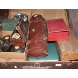 A vintage trunk of various items including a wooden Cadburys box, sets of bowls, metal cash box,