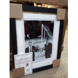 A framed signed picture of Tottenham Hotspur's Jimmy Greaves and Terry Dyson, with certificate.