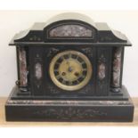 A late Victorian black set and marble architectural mantle clock, length 37.5cm.