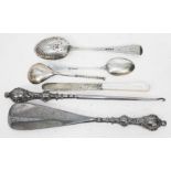 A mixed lot of hallmarked silver comprising two spoons, a silver handled shoe horn and button
