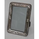 A modern hallmarked silver photo frame 12cm x 16.5cm.