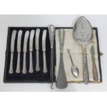 A cased set of six hallmarked silver handled knives, hallmarked silver handled button hook and