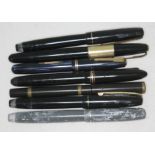 A seven of seven vintage fountain pens including four with nibs marked '14ct', another marked '14