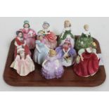 A group of ten Royal Doulton figures.