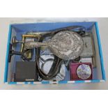 A box of metalware including silver backed mirror and cigarette lighters etc.