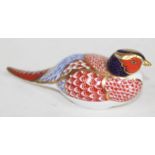 A Royal Crown Derby bird paperweight.