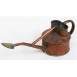 A Haws Genuine watering can.