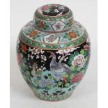 A Japanese famille noir ginger jar, height 24cm. Condition - hairline to lid.