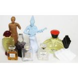 A collection of perfume bottles to include Cartier, Chanel, Art Deco and two figural bottles.