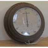 A vintage Smiths bakelite and metal circular wall clock, diameter 31cm.