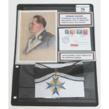 A reproduction Hermann Goering display with prints and a reproduction Pour le Merite medal.