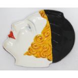 A Japanese Art Deco dish formed as a ladies head in side profile, length 15.5cm.