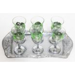 A Chinese white metal tray with 6 liquor drinking glasses.