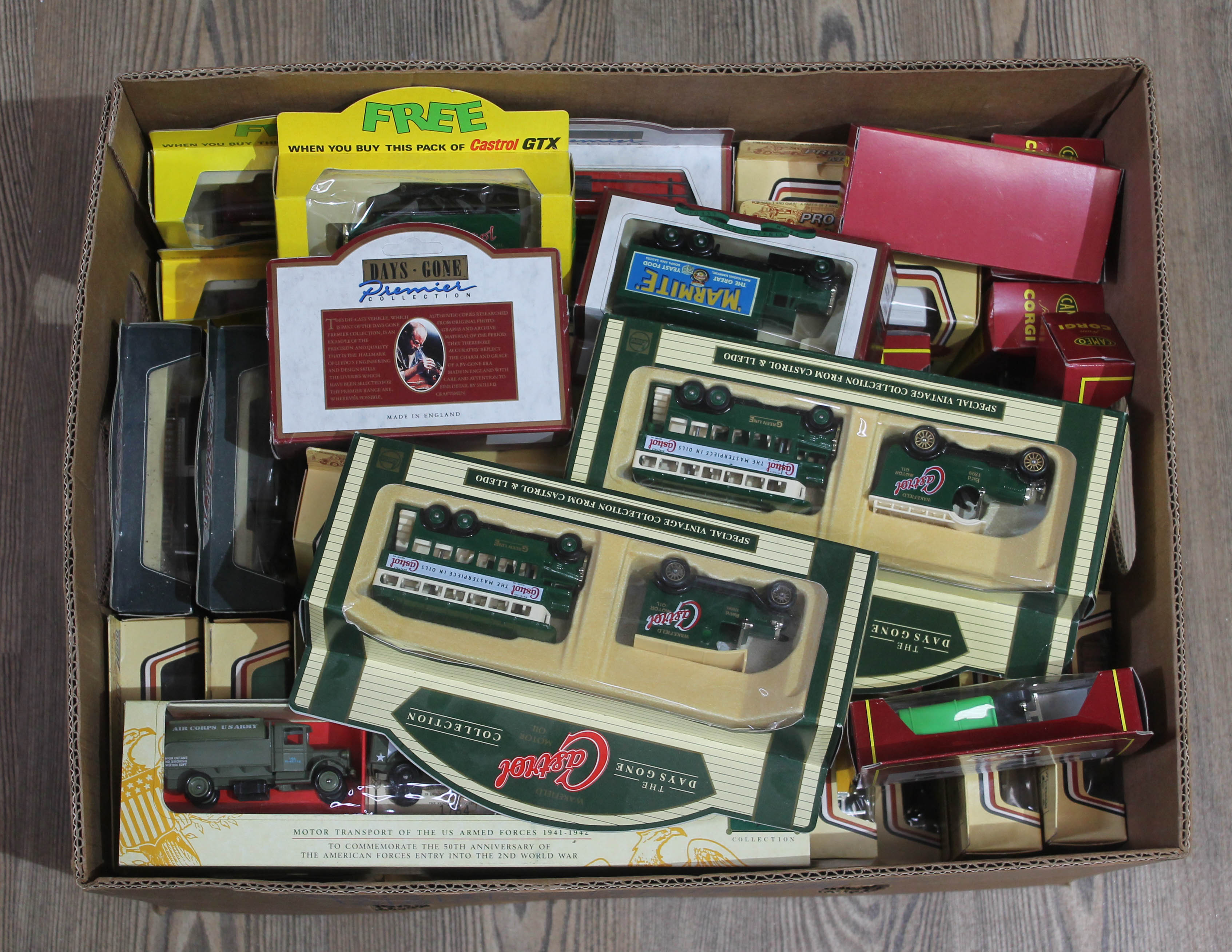 A collection of approx 63 boxed models vehicles including Lledo U.S. army collection, Days Gone